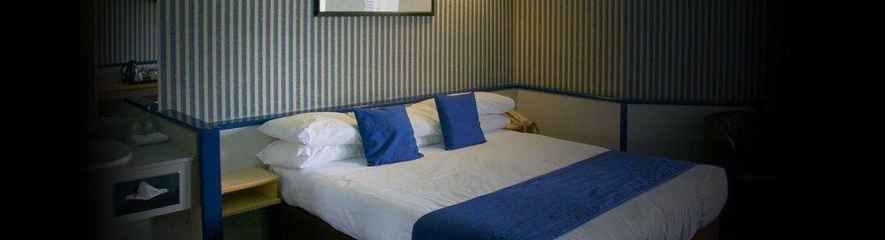 Damon'S Hotel Линкольн Экстерьер фото