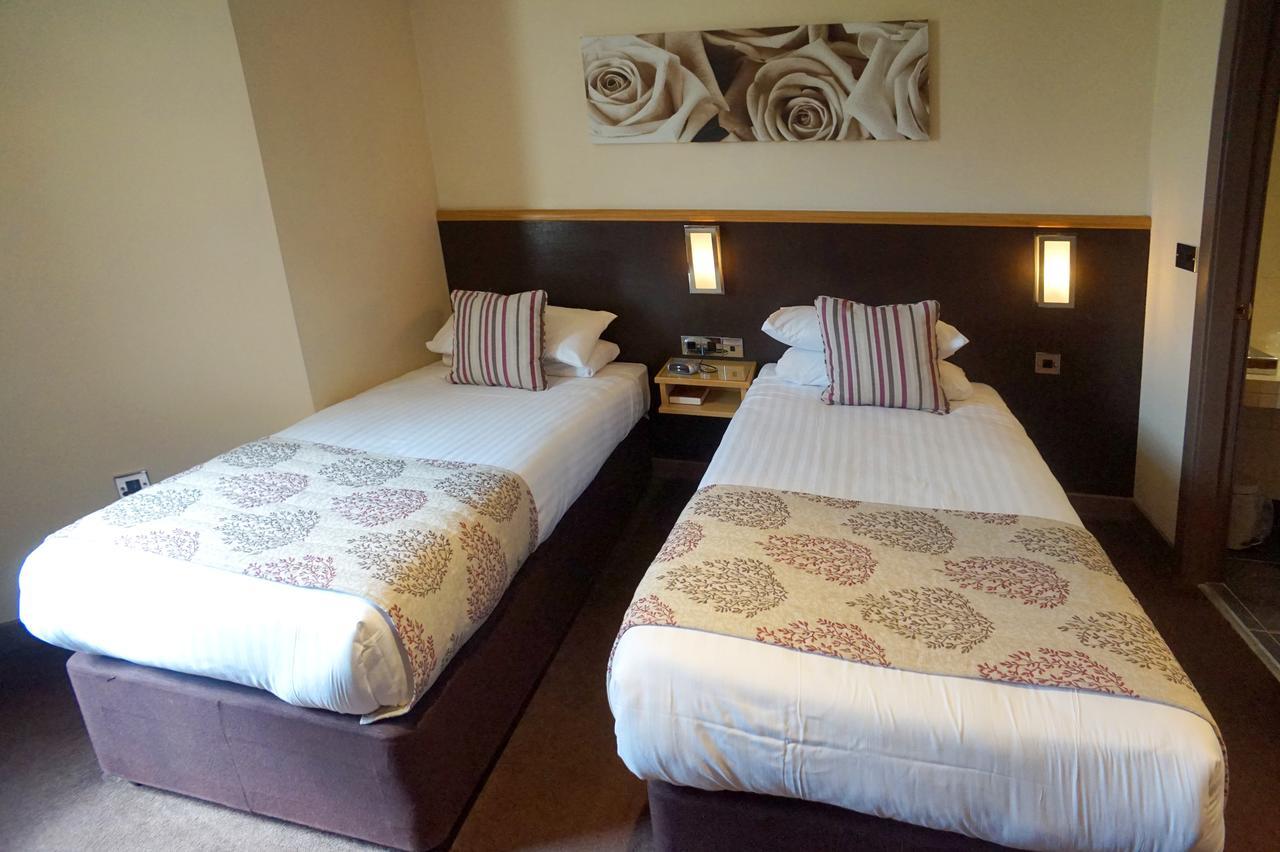 Damon'S Hotel Линкольн Экстерьер фото