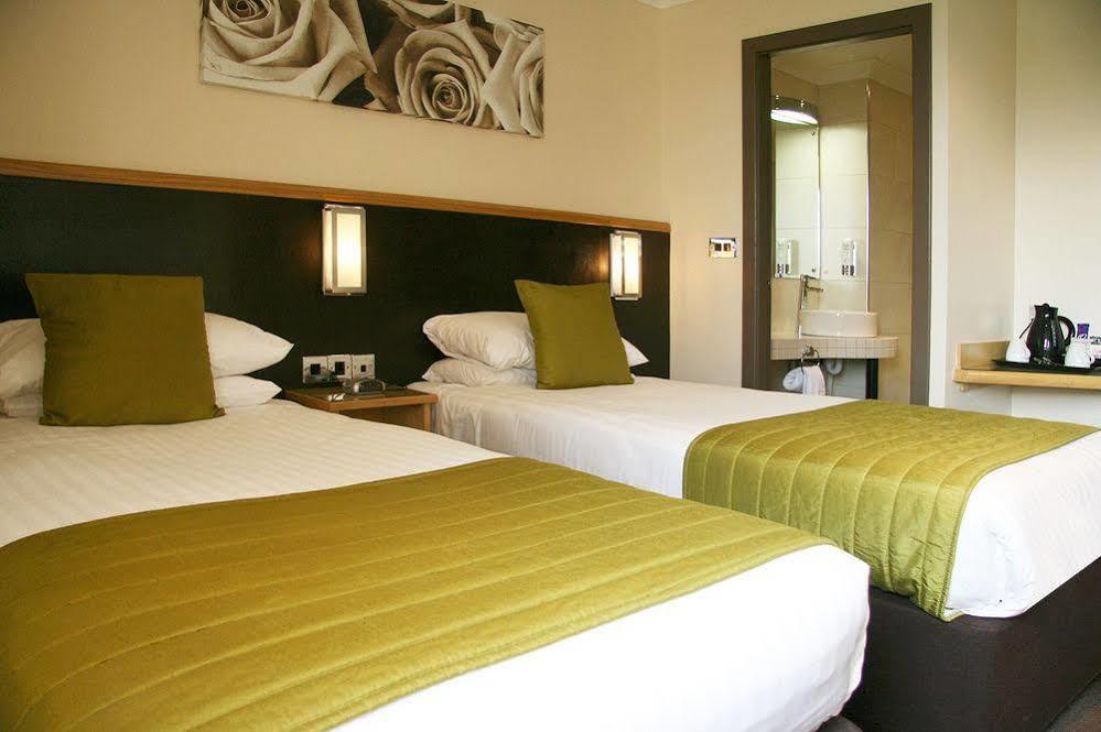 Damon'S Hotel Линкольн Экстерьер фото